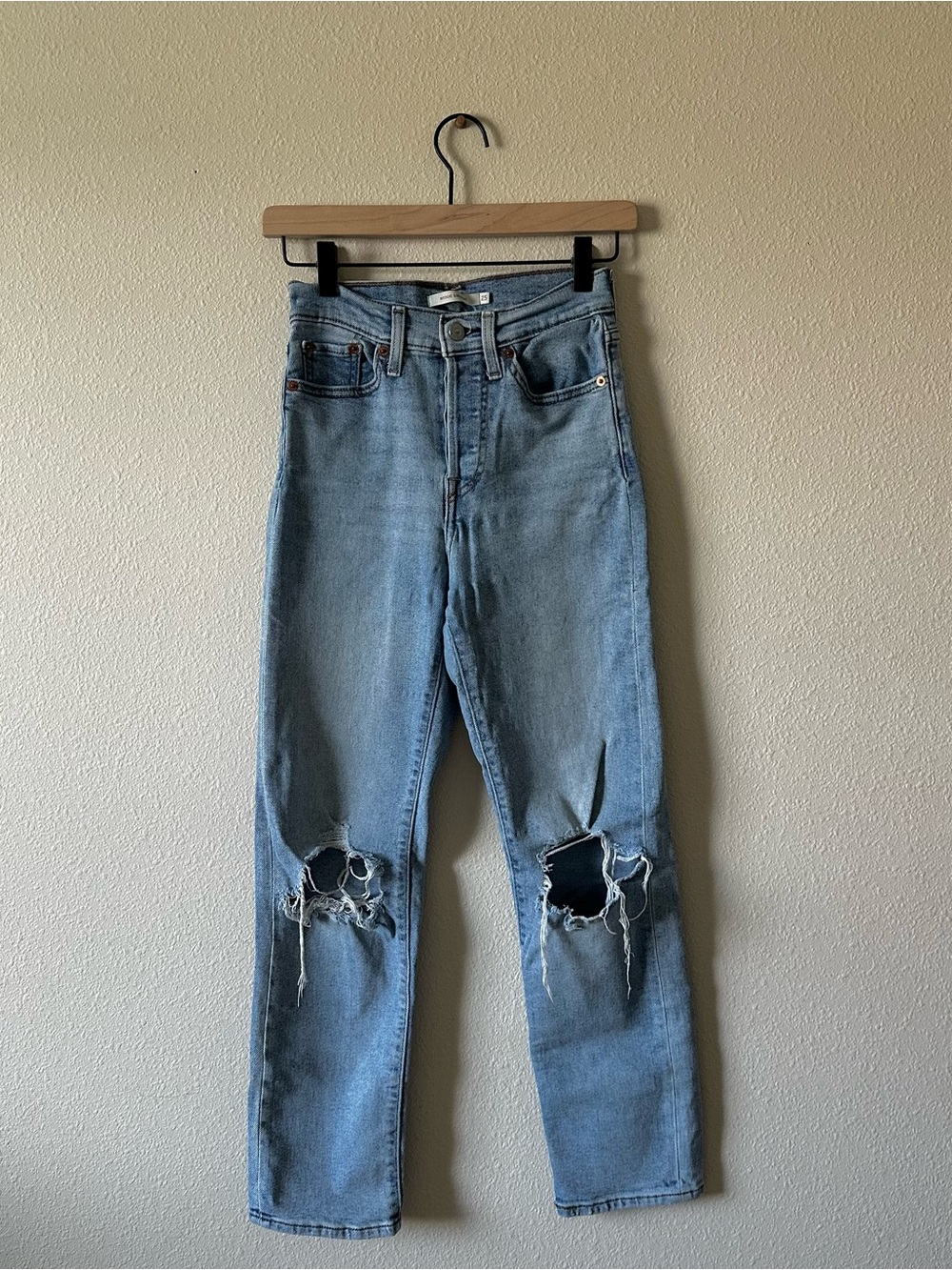 Levi's Light Blue Straight Leg Women's Jeans with Knee Rips